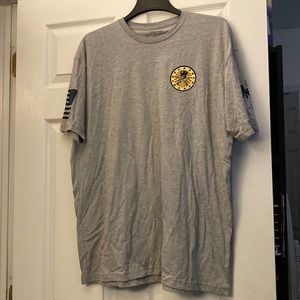 Grunt style men’s printed t shirt in gray. Never worn. Size XXL.